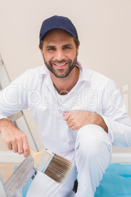 Painter smiling at the camera
