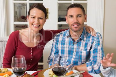 Cute couple smiling at camera