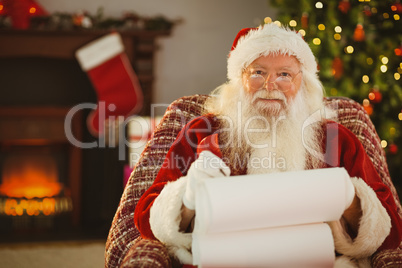 Happy santa writing list with a quill