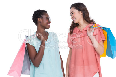 Female friends holding shopping bags