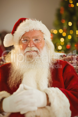 Portrait of cheerful santa with his glasses