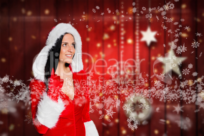 Composite image of woman wearing sexy christmas clothes