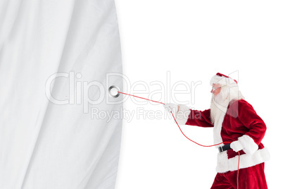 Santa claus pulling a rope