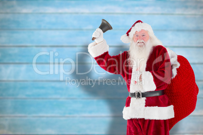 Composite image of santa claus ringing bell