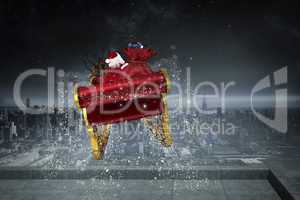 Composite image of santa flying his sleigh