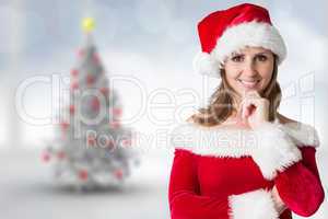 Composite image of pretty girl in santa outfit