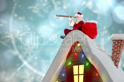 Composite image of santa sitting on roof of cottage Composite image of santa sitting on roof of cottage