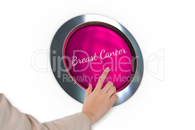 Hand pressing pink button for breast cancer awareness