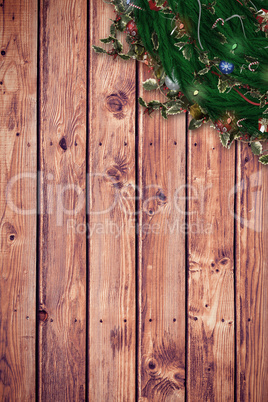 Composite image of festive christmas wreath with decorations