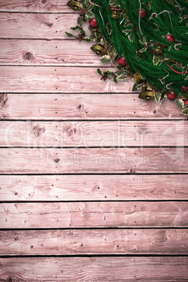 Composite image of festive christmas wreath with decorations