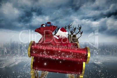 Composite image of santa flying his sleigh