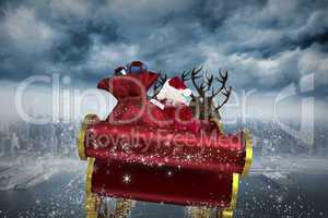 Composite image of santa flying his sleigh