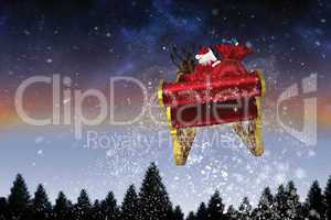 Composite image of santa flying his sleigh