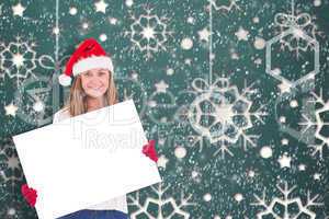 Festive blonde holding a poster