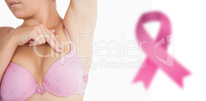 Composite image of woman performing self breast examination