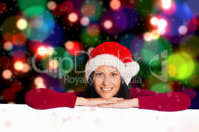 Composite image of woman smiling at the camera