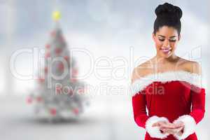 Composite image of pretty santa girl presenting with hands