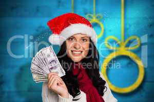 Composite image of woman holding some money