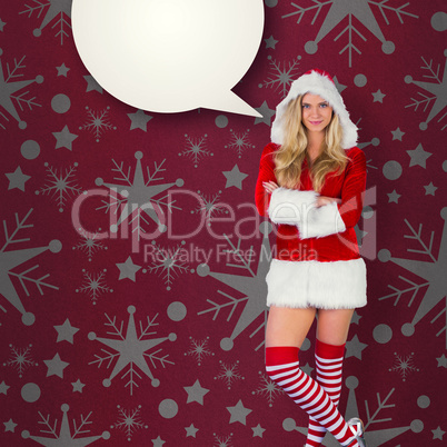 Composite image of pretty girl in santa outfit with arms crossed