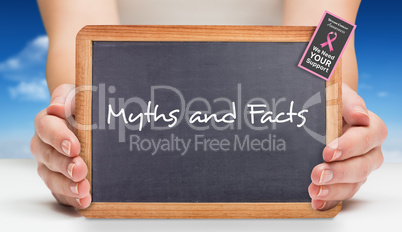 Composite image of females hands showing black board Composite image of females hands showing black board