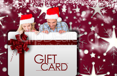 Composite image of young festive couple