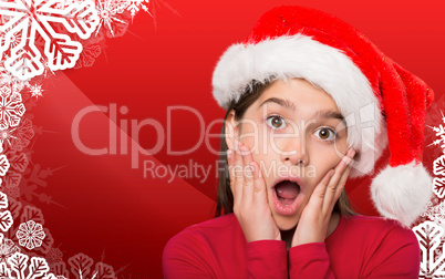 Composite image of festive little girl looking surprised