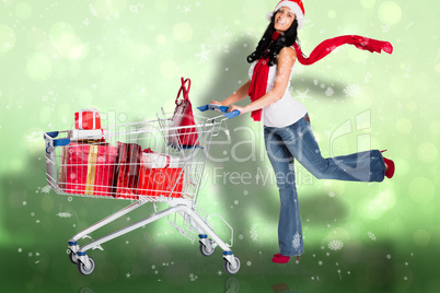 Composite image of woman standing with shopping trolley