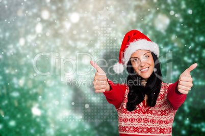 Composite image of woman giving a thumbs up