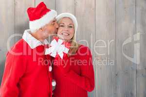 Composite image of festive couple