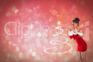 Composite image of pretty santa girl blowing over her hands