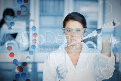 Composite image of serious chemist working with large pipette an