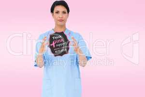 Doctor with breast cancer awareness message