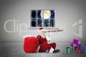 Composite image of santa looking through telescope