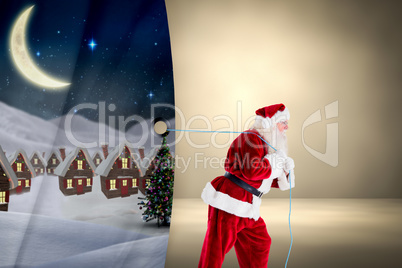 Composite image of santa claus pulling rope