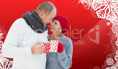 Composite image of mature couple holding mugs