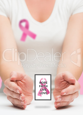 Woman presenting breast cancer awareness message