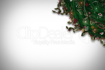 Composite image of festive christmas wreath with decorations