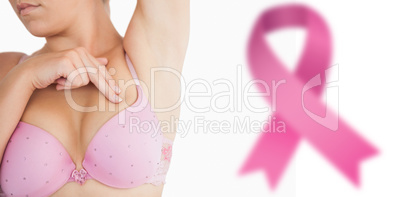 Composite image of woman performing self breast examination