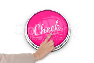 Hand pressing pink button for breast cancer awareness