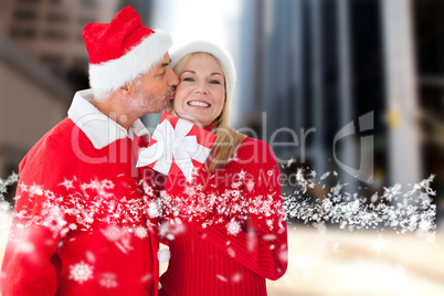 Composite image of festive couple