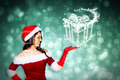 Composite image of pretty girl presenting in santa outfit