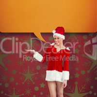 Composite image of pretty santa girl presenting with hand