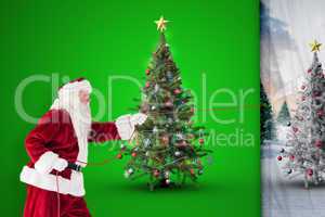 Composite image of santa pulls something with a rope