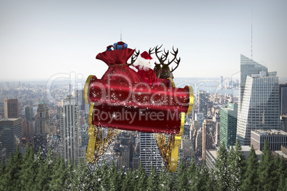 Composite image of santa flying his sleigh