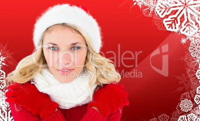 Composite image of happy festive blonde