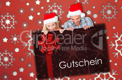 Composite image of young festive couple