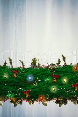 Composite image of fir branch christmas decoration garland