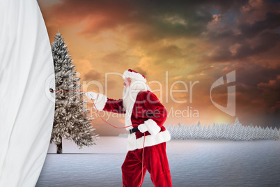 Composite image of santa pulls something with a rope