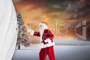 Composite image of santa pulls something with a rope