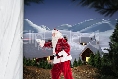 Composite image of santa pulls something with a rope